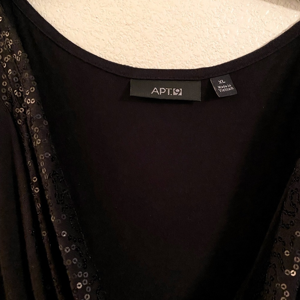 black blouse with little sequins on top